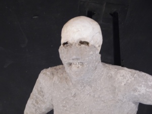 This is one of those casts of the bodies in Pompeii I was talking about. Check out his skull.